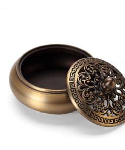 Lư đốt trầm và hương trầm bằng đồng